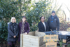 Employees from Highworth Grammar School and Landscape Services stand with the new compost bin